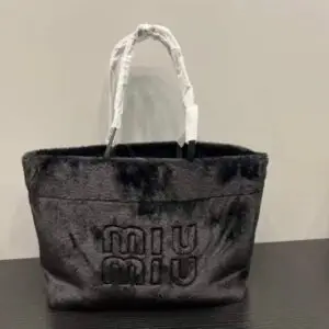 MIU MIU