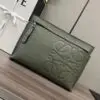 Design Brand T Logo-Debossed Full-Grain Leather Pouch - Dubai Fashion LUX