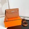 Design HANDBAGS KELLY DEPECHES 8F HANDBAG ETAIN - Dubai Fashion LUX