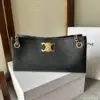 Design MEDIUM NEWSPAPER BAG IN SUPPLE CALFSKIN - Dubai Fashion LUX