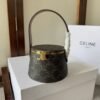 Design NINA MINAUDIERE IN LAMBSKIN WITH TRIOMPHE CANVAS PRINT AND CALFSKIN - Dubai Fashion LUX