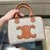 Design SMALL BOSTON IN STRIPED TEXTILE AND CALFSKIN - Dubai Fashion LUX