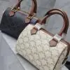 Design SMALL BOSTON IN TRIOMPHE CANVAS AND CALFSKIN - Dubai Fashion LUX
