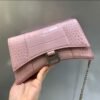 Hourglass crocodile-effect clutch bag - Dubai Fashion LUX