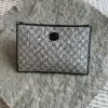 Gucci GG Supreme Pouch Bag